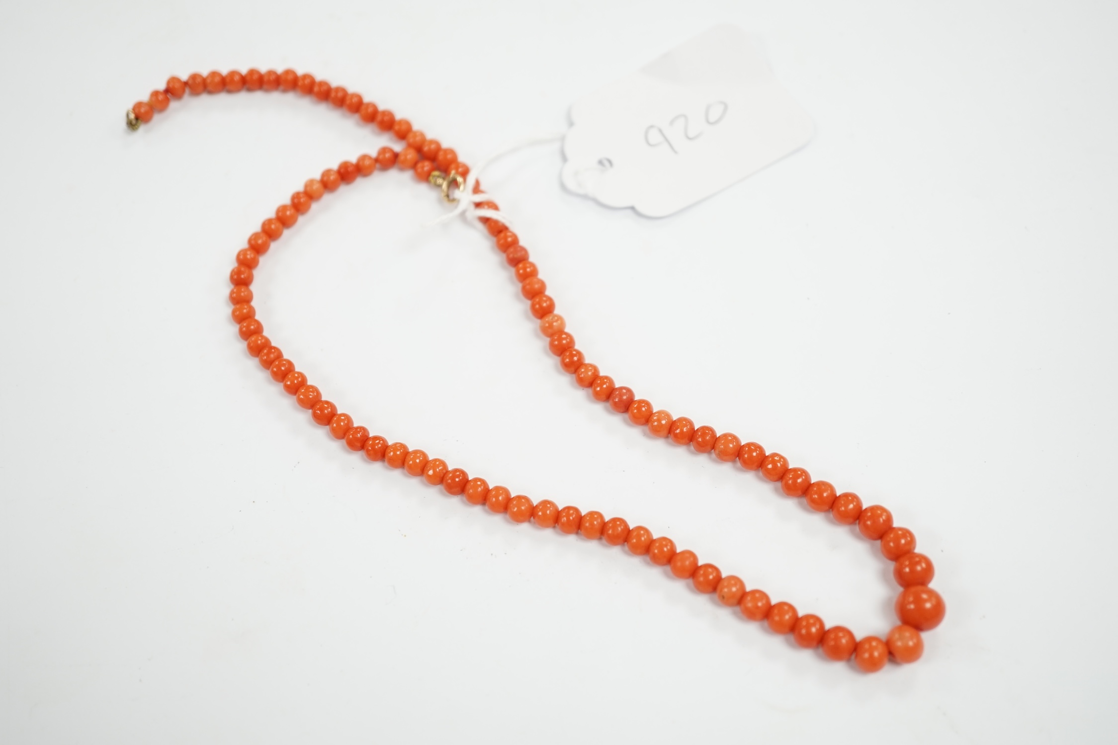 A single strand graduated coral bead necklace, with 9c clasp, 46cm. Condition - fair